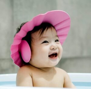 7669017062.jpg Baby Adjustable Safe Bathing Shower Cap (Pack of 2)